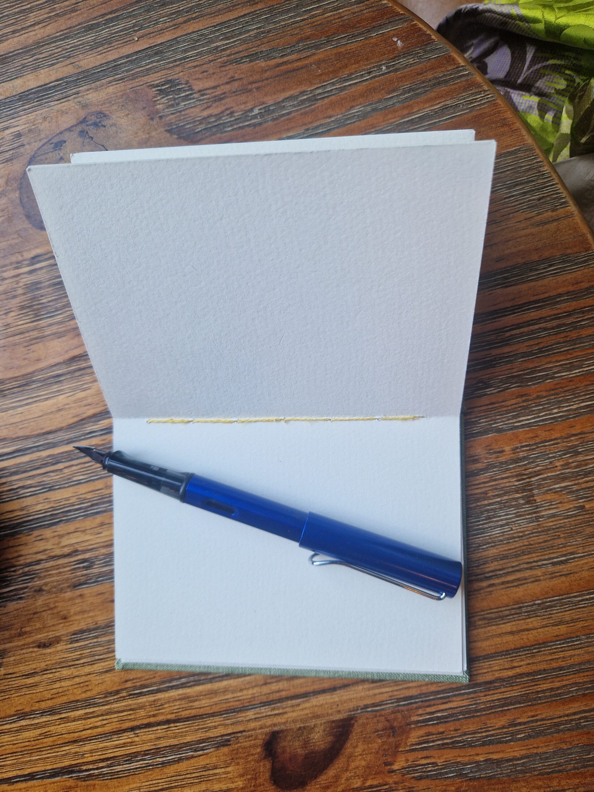 hand-crafted book open onto blank page